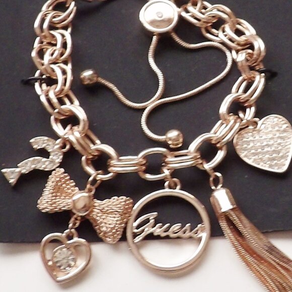 Guess Rose Gold Colored Charm Bracelet Adjustable Heart Tassel Question Mark NWT - Picture 4 of 5